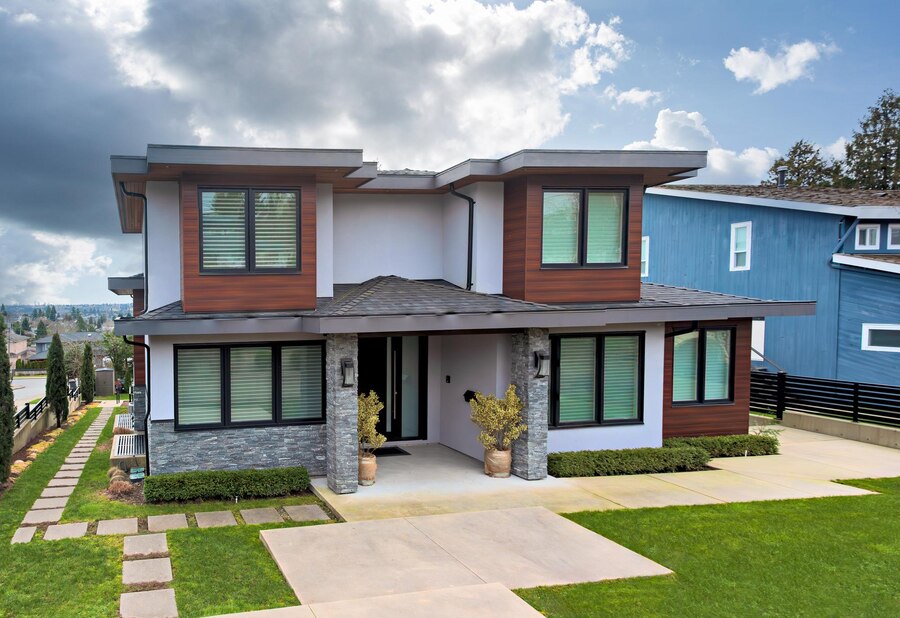 big-luxury-residential-house-cloudy-sky-background_769578-2857